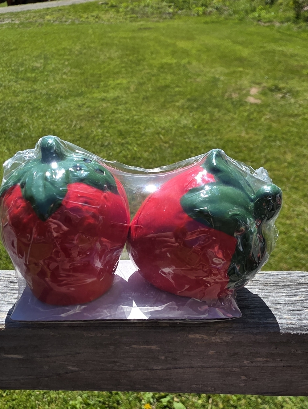 2.5" tall x 2" wide red & green ceramic strawberry fields salt & pepper shakers